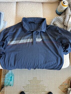 Men's Travis Matthew Polo 
 with Stripe